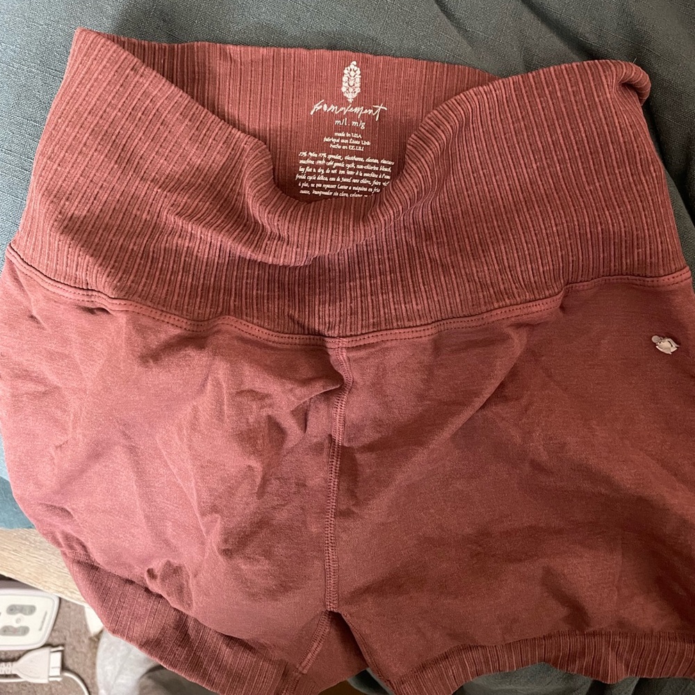 Rusty orange color, free people movement shorts M/L
Barely worn
